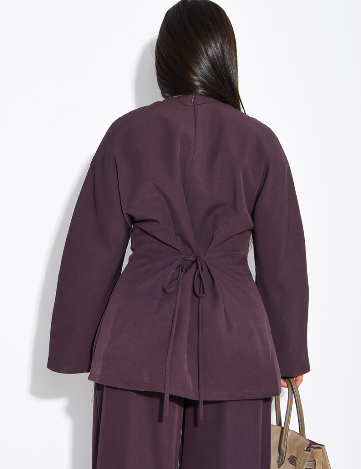 Long-sleeved top with a tie at the back