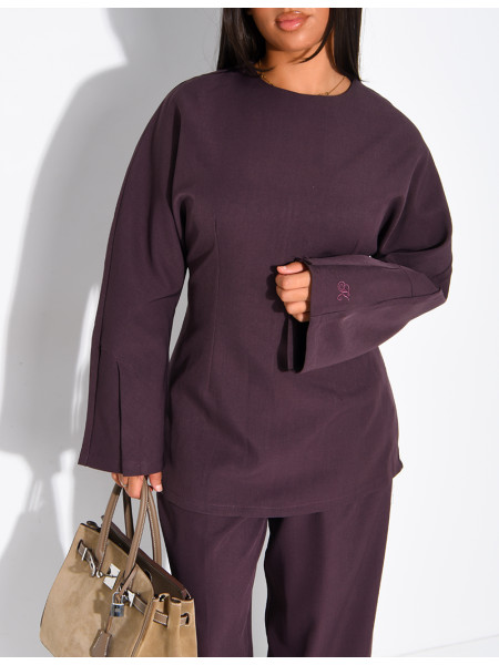 Long-sleeved top with a tie at the back