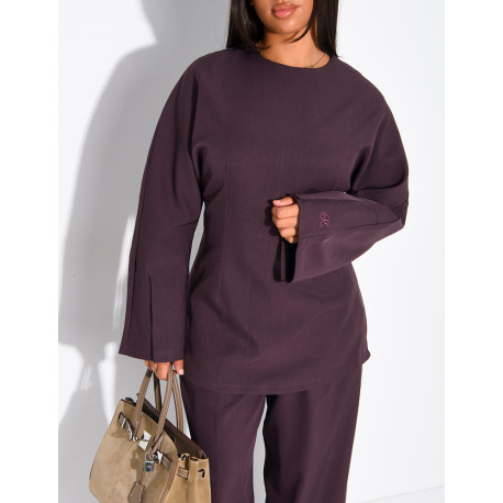 Long-sleeved top with a tie at the back