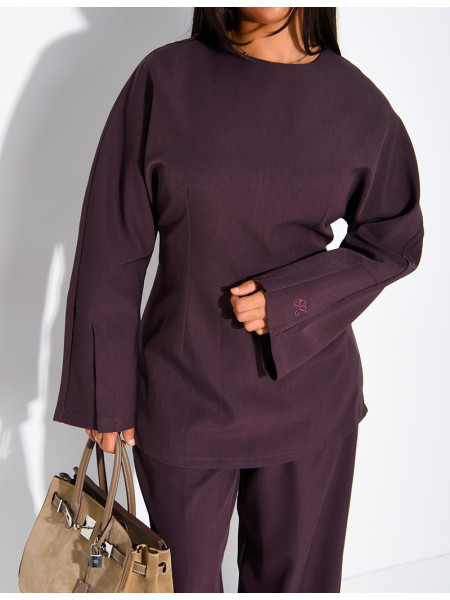 Long-sleeved top with a tie at the back