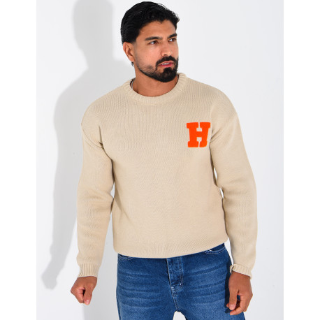 Pull en maille avec broderie lettre H