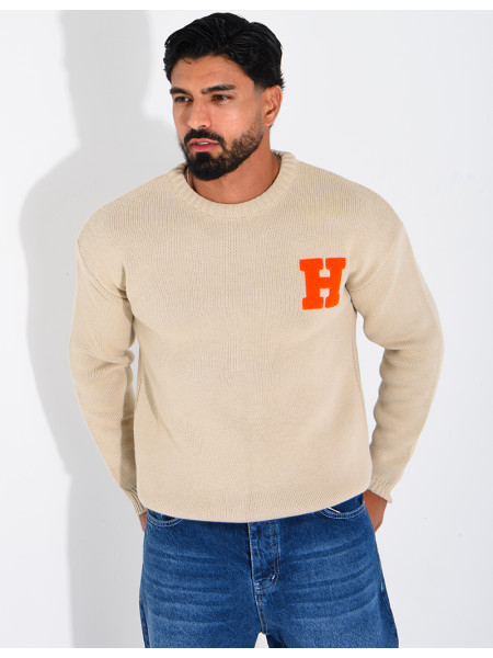 Pull en maille avec broderie lettre H