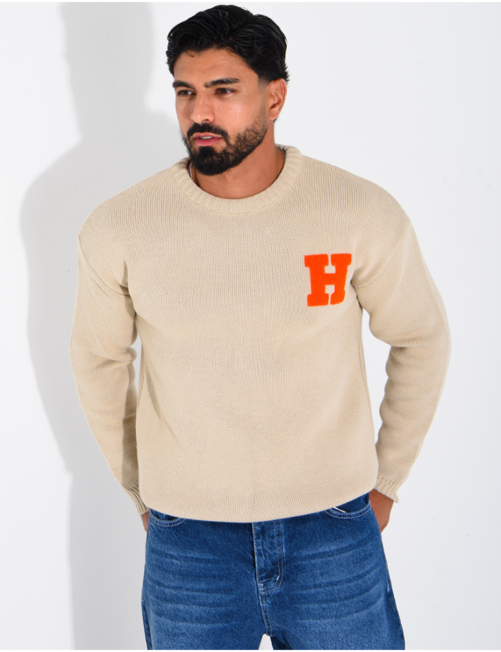 Pull en maille avec broderie lettre H