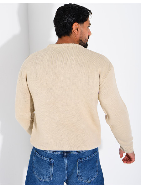Pull en maille avec broderie lettre H