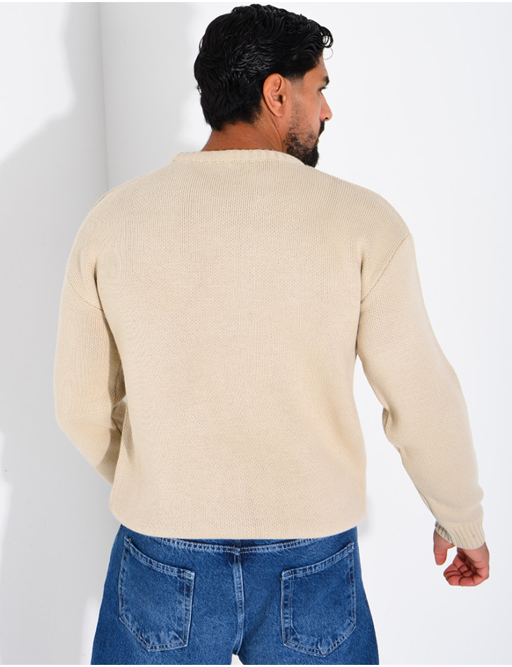Pull en maille avec broderie lettre H