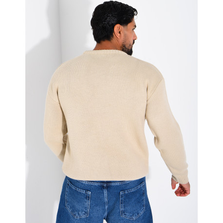 Pull en maille avec broderie lettre H