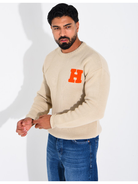 Pull en maille avec broderie lettre H