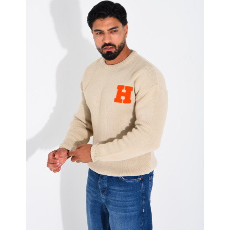 Pull en maille avec broderie lettre H