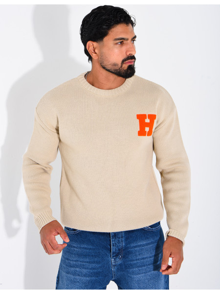 Pull en maille avec broderie lettre H