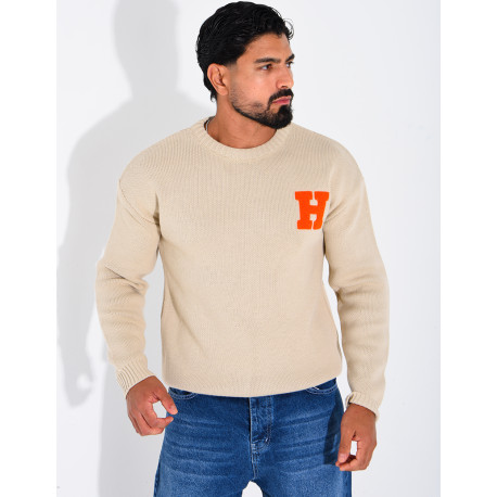 Pull en maille avec broderie lettre H