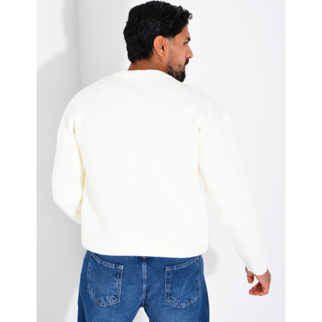 Pull en maille avec broderie lettre C