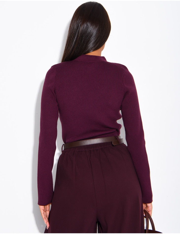 Asian-style ribbed sweater with ties at the collar