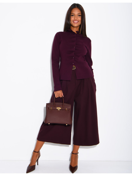Knitted jumper with gathered button placket