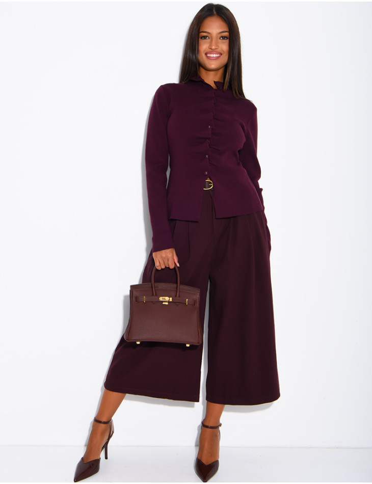 Knitted jumper with gathered button placket