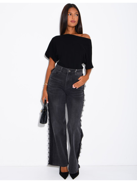 Jeans wide leg délavé à empiècements dentelle sur les côtés