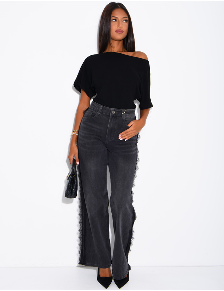 Jeans wide leg délavé à empiècements dentelle sur les côtés