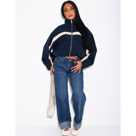 Jeans taille basse délavé à revers