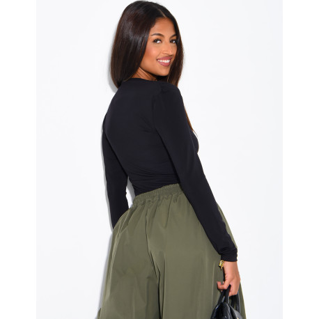 Asymmetrical gathered fluid top