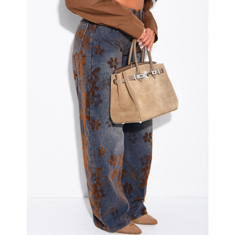 Faded balloon-cut jeans with embroidered velvet floral motifs